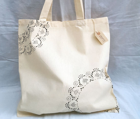 A Natural Cotton Tote Shoulder Bag with a Black Pattern design