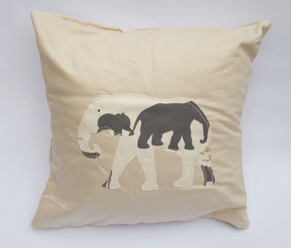 A Handmade Elephant Stencil Design Cushion on Light Beige