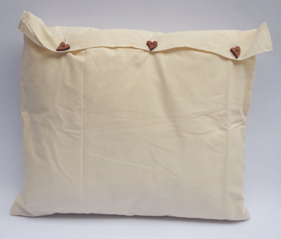 An Oblong Butterfly Bow Design Cushion