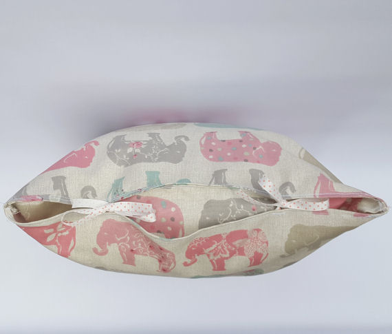 Handmade Pastel Coloured Elephant Design Cushion on Light Beige with Bows