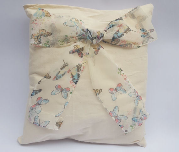 Natural Calico Oblong Butterfly Bow Design Cushion with Buttons