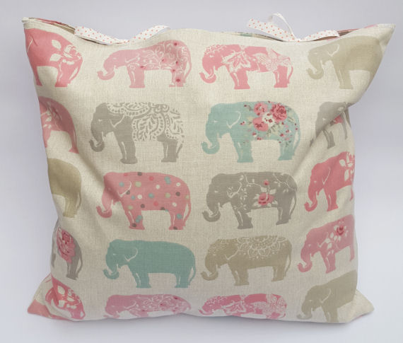 Handmade Pastel Coloured Elephant Design Cushion on Light Beige with Bows